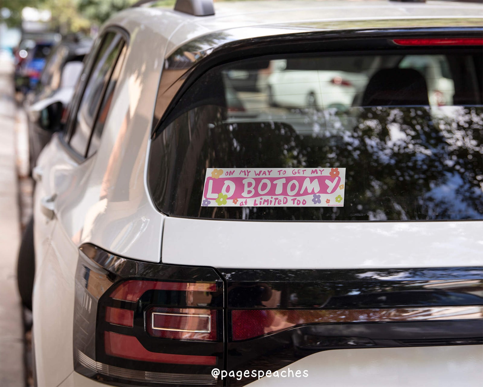Bumper sticker with the phrase “On my way to get my lobotomy at Limited Too” in pink bubble text