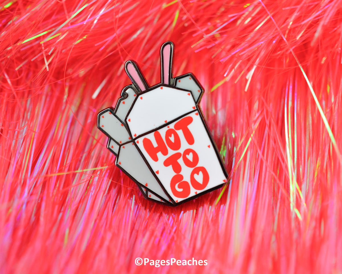 LGBTQ-themed enamel pin with red hearts, pink accents, and a flirty fast food vibe