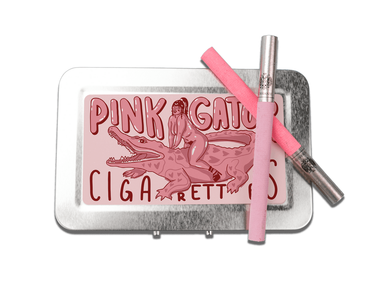 a tin of pink cat cigarettes and a pink cigarette lighter