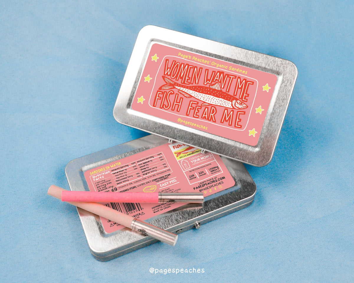 a small tin with a pink toothbrush inside of it