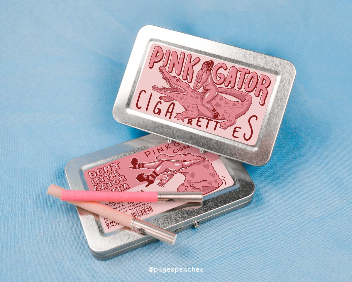 a tin of cigarettes with a pink stick in it