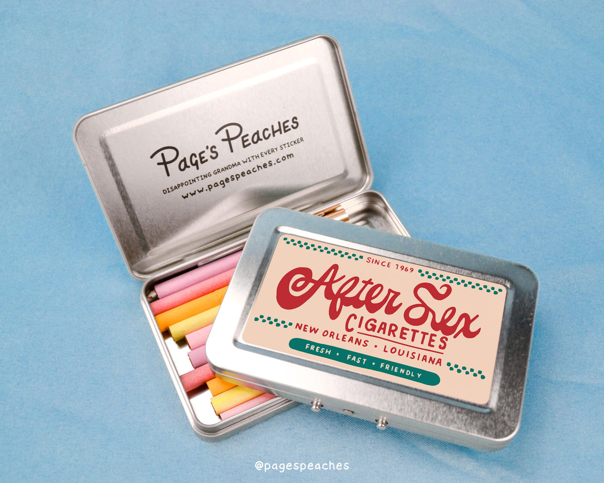 a tin with some colored pencils in it