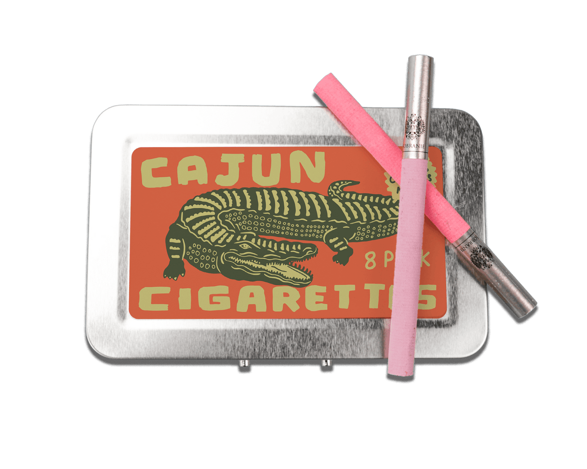 a cigarette holder with a cigarette and a lighter