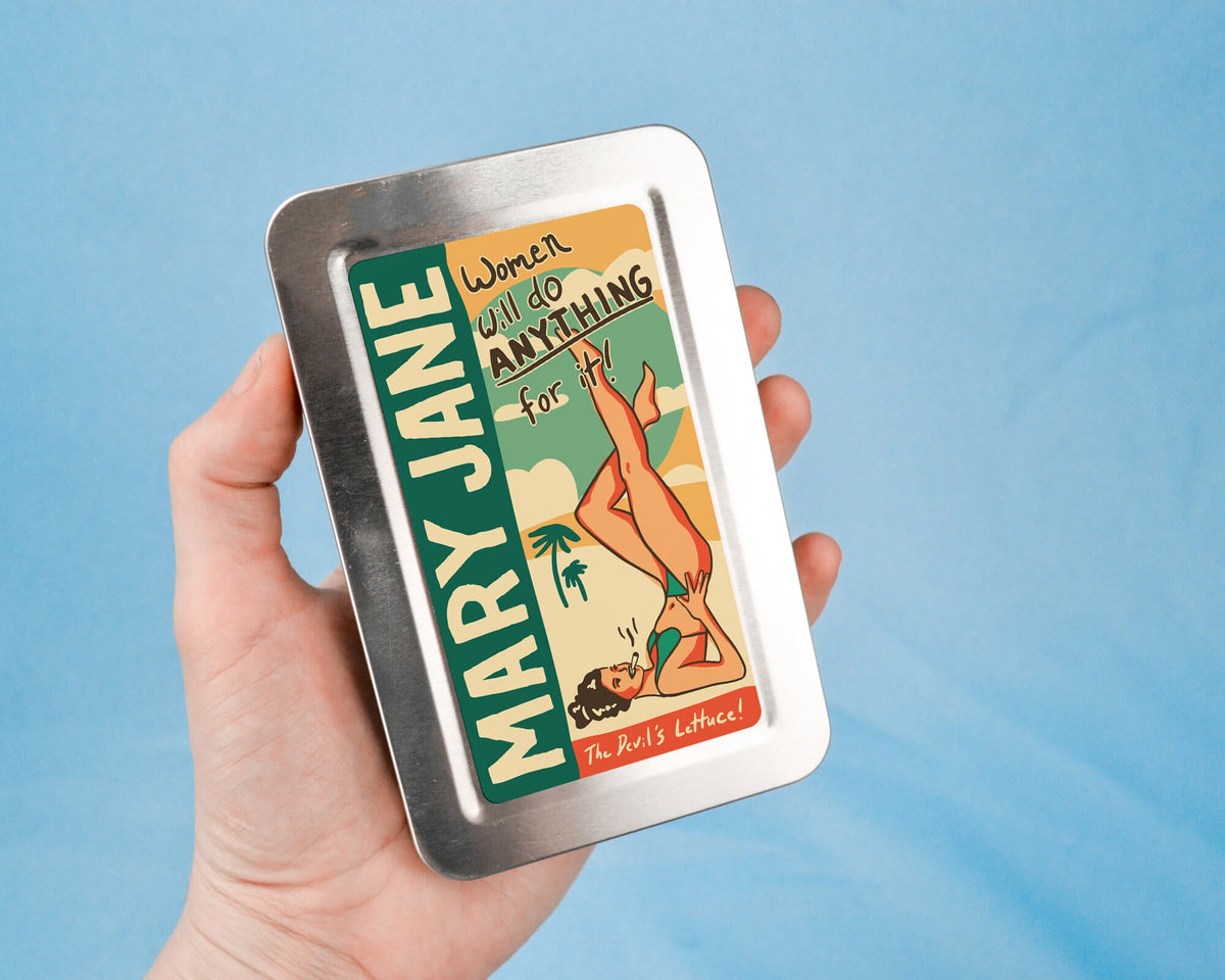 a person holding a tin with a picture of a woman on it